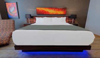 Luxurious and funky style delux king bed at Hotel Clique Calgary Airport.