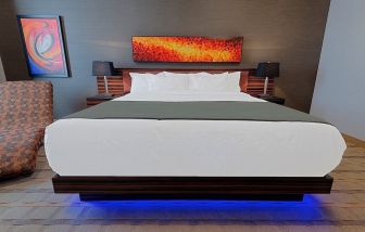 Luxurious and funky style delux king bed at Hotel Clique Calgary Airport.