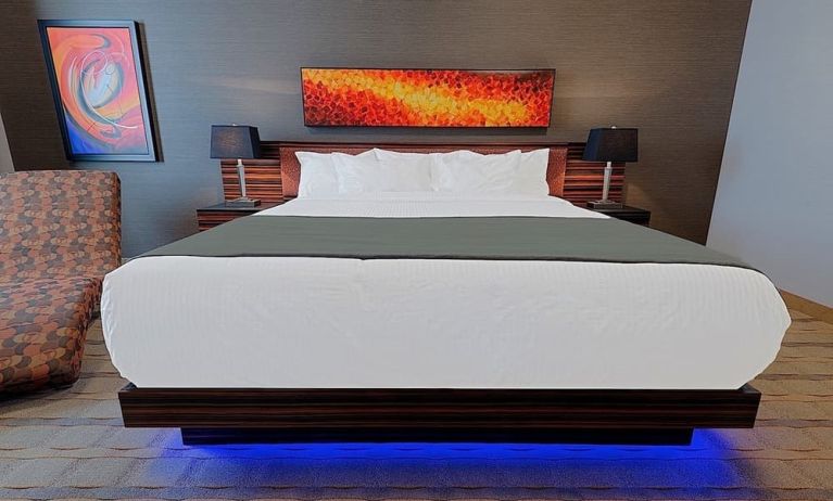 Luxurious and funky style delux king bed at Hotel Clique Calgary Airport.