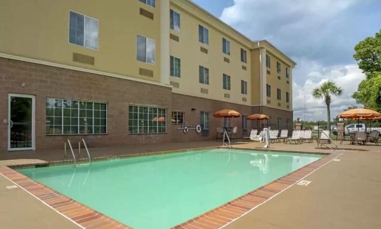 Large outdoor pool at Comfort Suites Alexandria, LA.