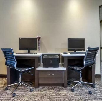 Well-equipped business center with PC, internet, and printer at Comfort Suites Alexandria, LA.