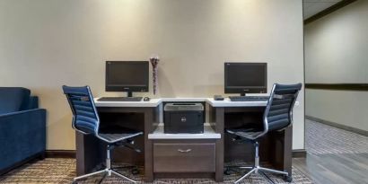 Well-equipped business center with PC, internet, and printer at Comfort Suites Alexandria, LA.