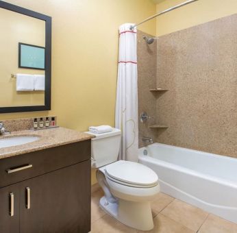 Private guest bathroom at Hawthorn Suites By Wyndham Longview.