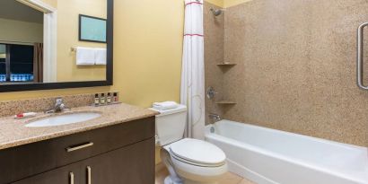 Private guest bathroom at Hawthorn Suites By Wyndham Longview.