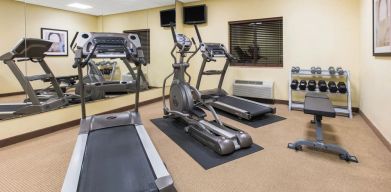 Equipped fitness center at Hawthorn Suites By Wyndham Longview.