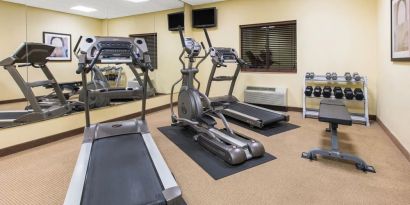 Equipped fitness center at Hawthorn Suites By Wyndham Longview.