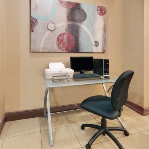 Dedicated business center with PC, internet, and printer at Hawthorn Suites By Wyndham Longview.