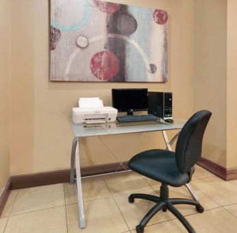 Dedicated business center with PC, internet, and printer at Hawthorn Suites By Wyndham Longview.