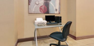 Dedicated business center with PC, internet, and printer at Hawthorn Suites By Wyndham Longview.