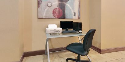 Dedicated business center with PC, internet, and printer at Hawthorn Suites By Wyndham Longview.