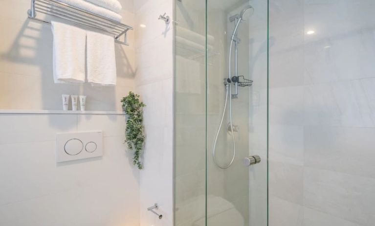 Private guest bathroom with shower at Hotel Kith.