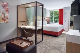 Spacious king room with TV and business desk at SpringHill Suites Atlanta Northwest.