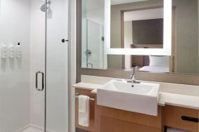 Private guest bathroom with shower at SpringHill Suites Atlanta Northwest.