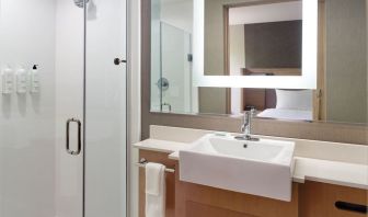 Private guest bathroom with shower at SpringHill Suites Atlanta Northwest.