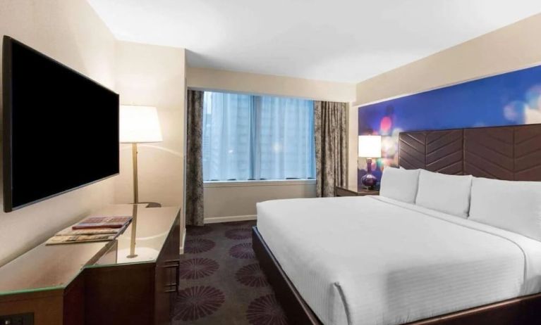 Comfortable delux king room with TV at The Chicago Hotel Collection - Magnificent Mile.