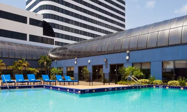 Stunning outdoor pool at Embassy Suites By Hilton West Palm Beach Central.