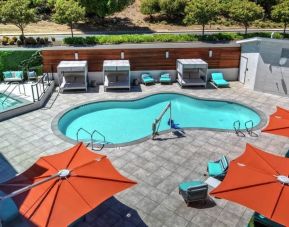 Stunning outdoor pool with sun beds at Hampton Inn Vallejo.