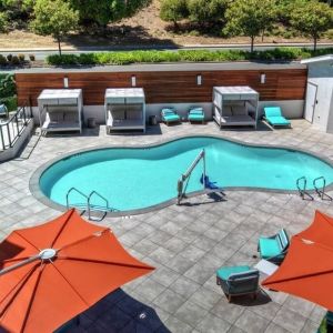 Stunning outdoor pool with sun beds at Hampton Inn Vallejo.