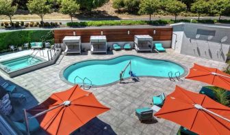 Stunning outdoor pool with sun beds at Hampton Inn Vallejo.