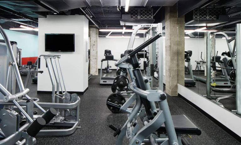 Well equipped fitness center at Club Quarters Hotel Houston.