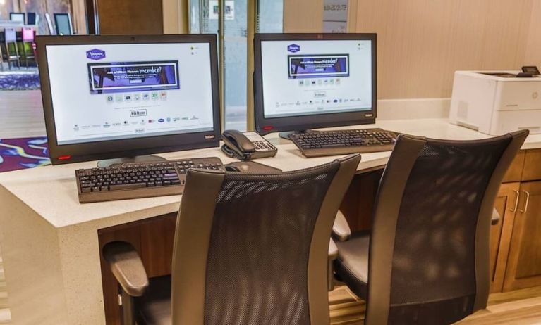 Business center with PC, internet, and printer at Hampton Inn & Suites Charlotte/Ballantyne.