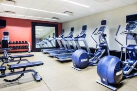 The hotel fitness center, with weights, benches, and exercise machines.