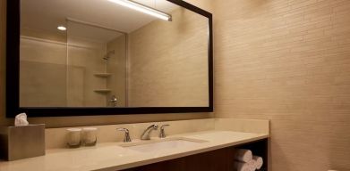 Private guest bathroom at Hilton New York Fashion District.