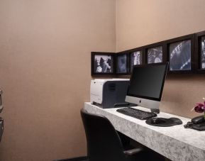 Business center with PC, internet, and printer at Hilton New York Fashion District.