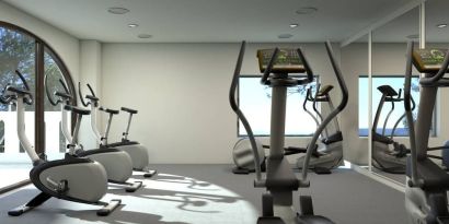 Well equipped fitness center with stationary bikes at Doubletree By Hilton Toluca.