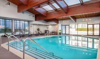 Lovely indoor pool with deck chairs at DoubleTree By Hilton Washington DC North/Gaithersburg.