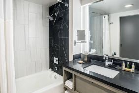 Private guest bathroom with shower at DoubleTree By Hilton Washington DC North/Gaithersburg.