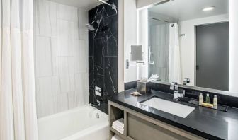 Private guest bathroom with shower at DoubleTree By Hilton Washington DC North/Gaithersburg.