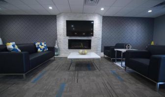 Lobby and coworking lounge at Home Inn & Suites.