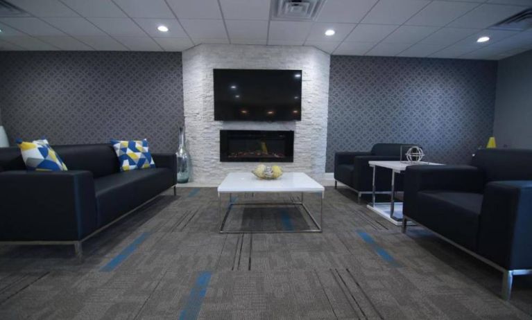 Lobby and coworking lounge at Home Inn & Suites.