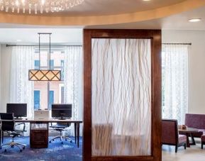 Business center with PC and printer at Homewood Suites By Hilton New Orleans French Quarter.
