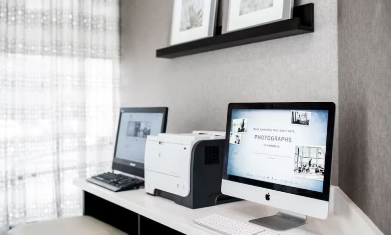 Business center with PC and printer at The Hollis Halifax - A DoubleTree Suites By Hilton.