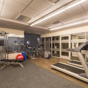 Hotel fitness center, with weights, treadmills, and other exercise equipment.