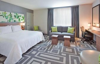 Guest room in Hilton Garden Inn New York Central Park South Mid-town West, with workspace desk and chair.