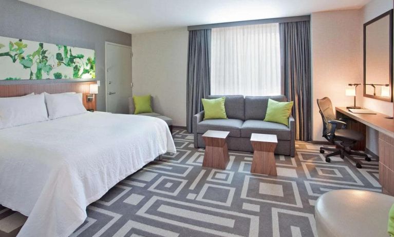 Guest room in Hilton Garden Inn New York Central Park South Mid-town West, with workspace desk and chair.