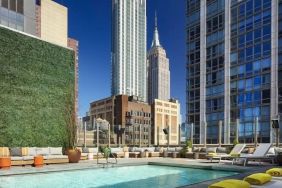 Stunning outdoor pool at Royalton Park Avenue.