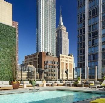 Stunning outdoor pool at Royalton Park Avenue.