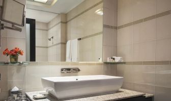 Private guest bathroom with shower at Royalton Park Avenue.