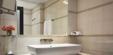 Private guest bathroom with shower at Royalton Park Avenue.