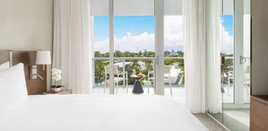 Lovely delux king room with natural light at The Altair Hotel Bay Harbor.