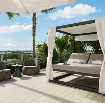 Relaxing cabanas available by the pool at The Altair Hotel Bay Harbor.