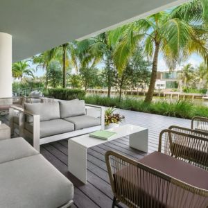 Comfortable outdoor lounge and coworking space at The Altair Hotel Bay Harbor.