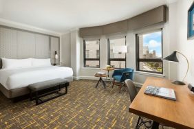 Spacious king room with natural light at Stanford Court San Francisco.