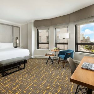 Spacious king room with natural light at Stanford Court San Francisco.