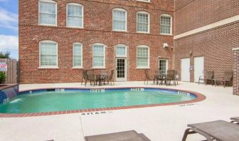 Refreshing outdoor pool at Liberty Hotel Cleburne, An Ascend Hotel Collection Member.