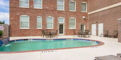 Refreshing outdoor pool at Liberty Hotel Cleburne, An Ascend Hotel Collection Member.